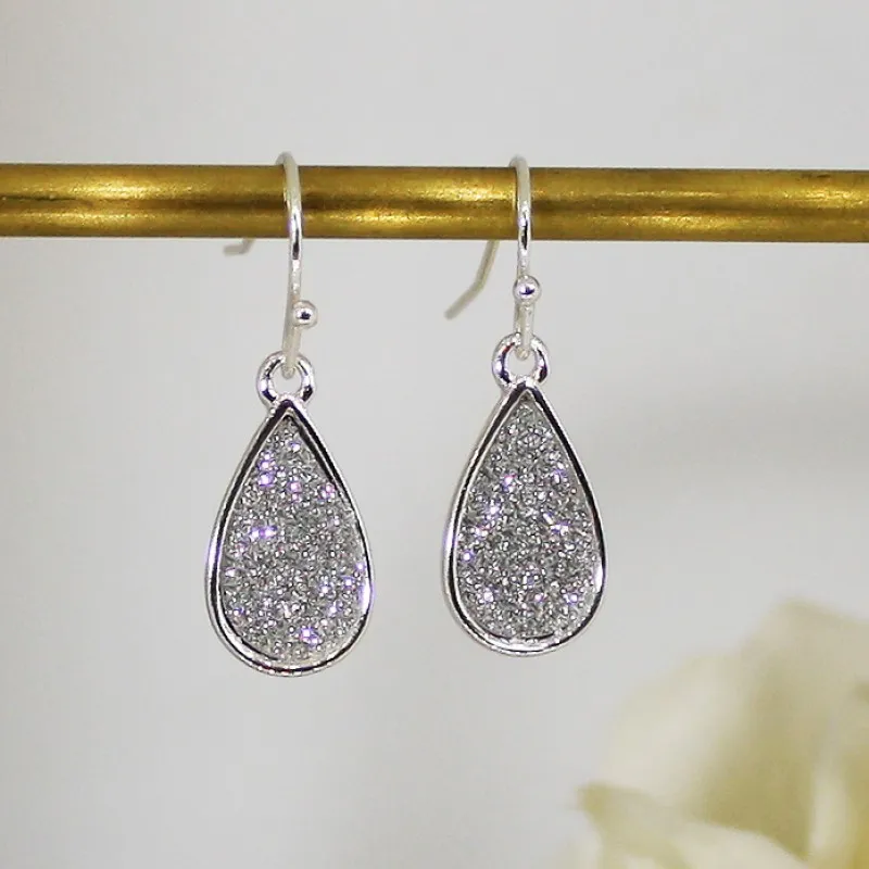 ΣΚΟΥΛΑΡΙΚΙΑ EAR SENSE DROP SILVER OVEL GLITTER ES 101